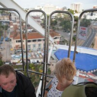 A photo taken from in a gondola, showing the view outside from high up.