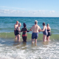 Group of participants in the ocean.